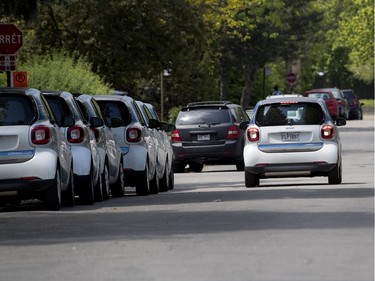 MONTREAL, QUE.: MAY 23, 2018-- A car2go backs up for almost a block on Canning Street as they look for a space to park in the reserved Car2Go spots during the C2 event in Montreal on Wednesday May 23, 2018. The car2go spots have removed public parking for block between Nortre-Dame and Workman. (Allen McInnis / MONTREAL GAZETTE) ORG XMIT: 60727