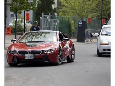 MONTREAL, QUE.: MAY 23, 2018-- A BMW test car enters the VIP parking area during the C2 event in Montreal on Wednesday May 23, 2018. BMW and other car makers are offering test drives increasing the in and out traffic from the C2 parking area. (Allen McInnis / MONTREAL GAZETTE) ORG XMIT: 60727