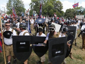 White nationalist demonstrators clash with counter demonstrators in Charlottesville, Va., last August. Members of the alt-right Montreal Storm chat group attended the rally.