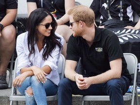 Prince Harry and Meghan Markle attend the wheelchair tennis competition during the Invictus Games in Toronto on Monday, Sep. 25, 2017.