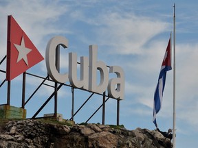 The Cuban national flag flies at half-staff in tribute to plane crash victims.