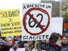 Protesters opposing Bill 62 and racism march during a demonstration in Montreal, Sunday, November 12, 2017.