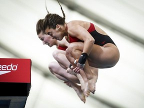 Canada's Meaghan Benfeito, right, and Caeli McKay, compete during the women's 10-metre open synchro event at the Canada Cup FINA Diving Grand Prix in Calgary, Alta., Saturday, May 12, 2018.
