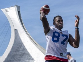Alouettes wide receiver Eugene Lewis warms up on a field next to the Olympic Stadium during training camp in Montreal on Friday, May 25, 2018.