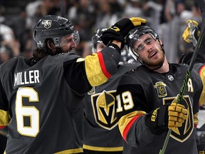 Reilly Smith is congratulated by teammate Colin Miller of the Vegas Golden Knights after scoring at T-Mobile Arena on Friday, May 18, 2018, in Las Vegas.