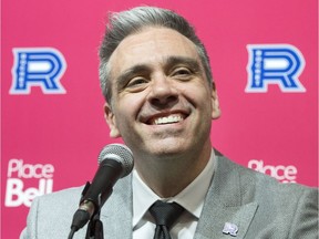 New Laval Rocket head coach Joël Bouchard smiles as he speaks to the media during a news conference at Place Bell on May 17, 2018.