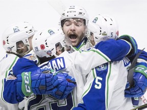 Swift Current Broncos' Giorgio Estephan celebrates his goal against the Acadie-Bathurst Titan with his teammates during first period of Memorial Cup action in Regina, Sask., on Saturday, May, 19, 2018.
