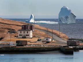 A large iceberg is visible from the shore in Ferryland, an hour south of St. John's, Newfoundland on Monday, April 10, 2017.