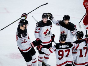 Canadian players celebrate a Ryan Nugent-Hopkins goal against Russia at the world hockey championships on May 17.