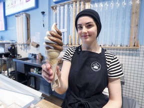 Catherine Viens with a soft-serve ice cream cone at Les Givres ice cream shop on Masson St. in Montreal on May 22, 2018.