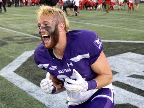 Western's Jordan Beaulieu celebrates as the Mustangs beat Laval to win the Vanier Cup last November in Hamilton. at Tim Hortons Field in Hamilton on Saturday November 25, 2017.  The Mustangs dominated winning 39-17 over Laval. Mike Hensen/The London Free Press/Postmedia Network ORG XMIT: POS1711251722234004