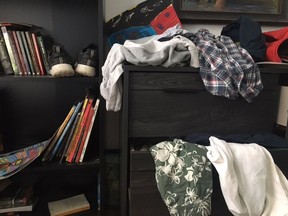 Teenagers are known for having messy rooms, and Celine Cooper's son is no exception. "He's got a dresser for his clothes, but this, of course, would necessitate a certain amount of folding and organizing. Instead, every drawer is open. Stuff just cascades out." Photo courtesy of Celine Cooper