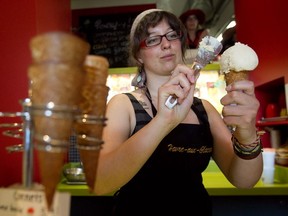Jacinthe Leger-Leduc serves up a cone of ginger ice cream at Havre-aux-glaces in the Jean Talon Market.