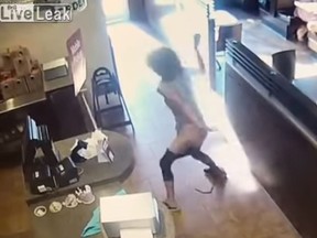 A woman at a Langley, B.C. Tim Hortons hurled feces at employees this past Monday. (LiveLeak)