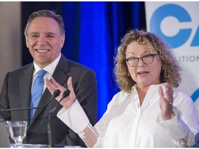 Marguerite Blais speaks to supporters with Coalition Avenir du Québec leader Francois Legault in May 2018.