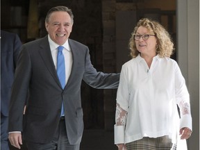 Marguerite Blais, former Quebec Liberal cabinet minister, and Coalition Avenir du Quebec leader François Legault arrive at a news conference to announce her candidacy for the riding of Prevost north of Montreal Friday, May 11, 2018.