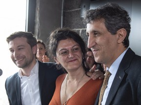 Québec Solidaire MNA Amir Khadir, flanked by his wife Nima Machouf and fellow MNA Gabriel Nadeau-Dubois, will be honoured Saturday night as part of a weekend gathering of the party.