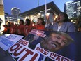Protesters rally to denounce the United States' policies against North Korea near the U.S. embassy in Seoul, South Korea, Friday, May 25, 2018. North Korea said Friday that it's still willing to sit down for talks with the United States "at any time, at any format" just hours after President Donald Trump abruptly canceled his planned summit with the North's leader Kim Jong Un. The signs read: " Denounce Trump."