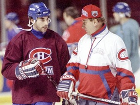 The 1993 champion Canadiens "were a young team and in a lot of ways that helped us, especially in Montreal where the pressure was so great," says Mathieu Schneider, skating with head coach Jacques Demers before the start of a team practice at the Forum in 1995.