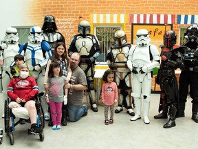 501st Legion fan club and Mandalorian Mercs Costume Club members visit children at a Quebec City hospital dressed as Stormtroopers