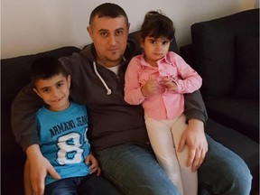 Taha El Taha, at home in Montreal on Tuesday, May 22, 2018, with Ahmad, 7 and Tala, 3.