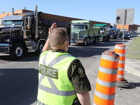 Convoys of dump trucks were reported near the Turcot Interchange and on westbound Highway 720.