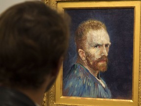 A patron looks at a self portrait by Vincent van Gogh at a 2014 exhibition at the Montreal Museum of Fine Arts. While the famous painter may have been mentally ill, there is no proof that people who live with mental illness are innately more creative than non-mentally ill people, Julie Anne Pattee writes.