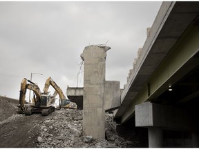 Crews demolish the elevated Ville-Marie Expressway as part of the Turcot Interchange project in Montreal on March 1, 2018.