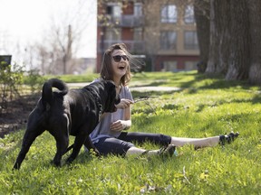 Hot dog: Bianca Dancose-Giambattisto plays with Maximilien in Charlevoix Rufus-Rockhead Park on one of the first warm days in Montreal in 2018. There's more hot weather on the way.