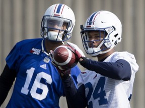 Montreal Alouettes' Amir Carlisle catches the ball for QB Antonio Pipkin during a team practice in Montreal on Friday May 25, 2018.