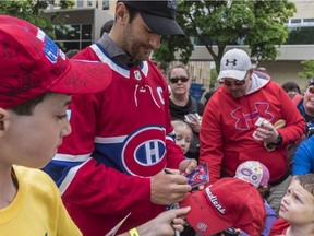 Canadiens captain Max Pacioretty signs autographs during annual Hockey de Rue charity event at the YM-YWHA on Westbury Ave. in Montreal on May 27, 2018.
