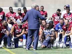 Alouettes head coach Mike Sherman addresses his players at the end of practice in Montreal on Wednesday, May 30, 2018.