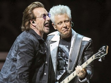 Bono, left, and Adam Clayton perform during U2 concert at the Bell Centre in Montreal Tuesday June 5, 2018.