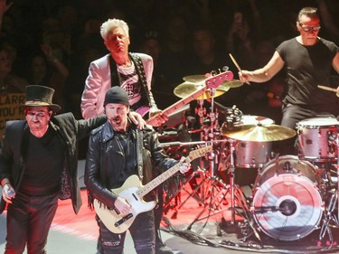 U2, from left, Bono, The Edge, Adam Clayton, rear, and Larry Mullins, Jr. in concert at the Bell Centre in Montreal Tuesday June 5, 2018.