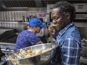 Community worker Howard Johnson, gave a cooking class at the NDG Food Depot on a recent Wednesday; it featured a lesson on making jerk chicken, rice and peas, and steamed cabbage.  (Dave Sidaway / MONTREAL GAZETTE)