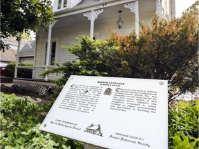 A heritage plaque is posted on the lawn in front of Maison Lafrance at 18 Martin Ave. in Dorval. Dorval has agreed to a demolition request for the home that dates back to 1888.