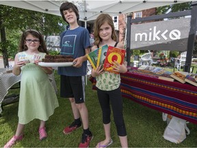 Erin Plessis (left to right), Felix Antoine Prieur, and Penelope-Lili Prieur with their different products they were selling in Hudson at Mikko Espresso & Boutique during Young Entrepreneurs Day on Saturday. The day allowed children age 5-12 to sell crafts, lemonade or other goods as part of a province-wide event to inspire young entrepreneurs.