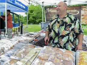 Thierry Juvien works at his stall, Artisan du Terroir, at Marché des Saveurs de L'Ile-Perrot, a seasonal market which operates Wednesdays from 3 to 7 p.m. until Sept. 26.