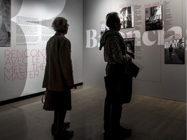 Visitors to the Balenciaga exhibit at the McCord Museum, the only North American venue for Balenciaga, Master of Couture.