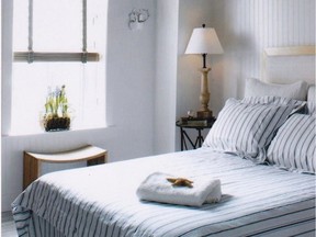 A bright, neutral coloured room helps creates an inviting guest room.