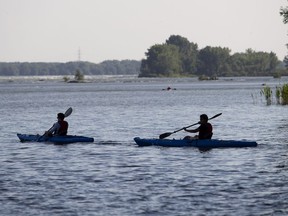 MONTREAL, QUE.: JUNE 29, 2018 -- Kayakers head out on to the Saint Lawrence River in Montreal, on Friday, June 29, 2018. (Allen McInnis / MONTREAL GAZETTE) ORG XMIT: 60975