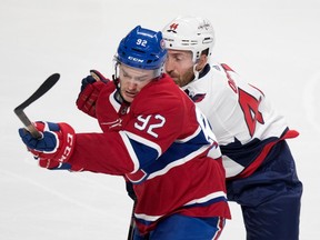 Canadiens forward Jonathan Drouin gets pressured by Capitals defenceman Brooks Orpik during preseason play at the Bell Centre last season.