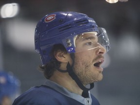 Defenceman Zach Redmond takes a break during practice with the Canadiens at the Bell Sports Complex in Brossard on Sept. 28, 2016.
