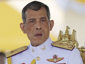 In this May 9, 2016, photo,Thailand's Crown Prince Vajiralongkorn is seated at the royal plowing ceremony in Bangkok. Thailand's Royal Palace said on Thursday, Oct. 13, 2016, that Thailand's King Bhumibol Adulyadej, the world's longest reigning monarch, has died at age 88.