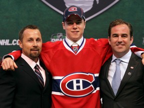 "We want players with character and we'll be looking at speed because it's a fast game,” Trevor Timmins, Canadiens director of player personnel, says of the NHL Entry Draft. Timmins, left, is seen here with the team’s seventh overall pick, Nathan Beaulieu, and Canadiens owner Geoff Molson at the 2011 draft in St Paul, Minn.