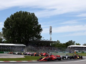 Ferrari's Sebastian Vettel leads the field at the start of the Canadian Grand Prix at Circuit Gilles Villeneuve on Sunday. He cruised to victory from there.