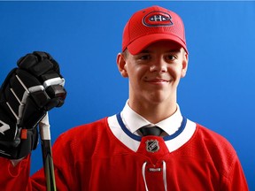 Jesperi Kotkaniemi poses for photo after being selected third overall by the Canadiens during the first round of the 2018 NHL Draft on June 22, 2018 at the American Airlines Centre in Dallas.