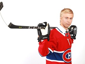 Finnish right-winger Jesse Ylönen poses for photo after being selected by the Canadiens in the second round (35th overall) of the NHL Draft on June 28, 2018 in Dallas.