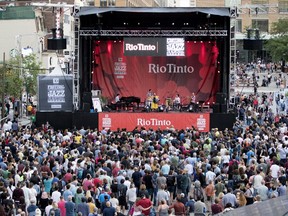 A crowd fills in Sainte-Catherine Street to listen to Banda Magda during the opening day of the Montreal International Jazz Festival in Montreal on Thursday June 28, 2018.