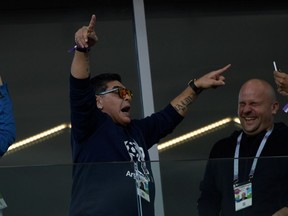 Argentina's football legend Diego Maradona celebrates Argentina's opening goal during the Russia 2018 World Cup Group D football match between Argentina and Iceland at the Spartak Stadium in Moscow on June 16, 2018.